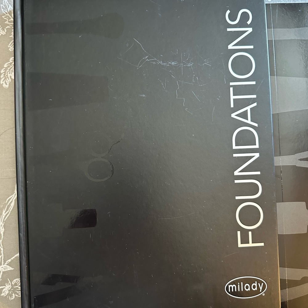 Milady Foundations text book and work book